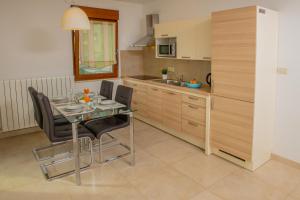 Kuchyň nebo kuchyňský kout v ubytování Apartments Oliva
