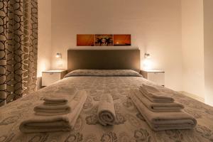 Postel nebo postele na pokoji v ubytování B&B Il Sognatore