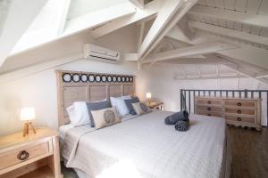 Ein Bett oder Betten in einem Zimmer der Unterkunft Résidence La Plage Orient Bay by La Conciergerie FWI