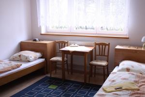 Postel nebo postele na pokoji v ubytování Penzión Koras