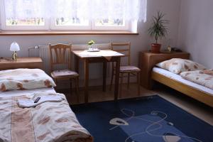 Postel nebo postele na pokoji v ubytování Penzión Koras