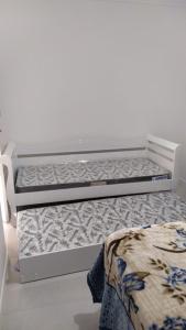 En eller flere senge i et værelse på Espaço Luanda - Ingleses Florianopolis + 25 billeder