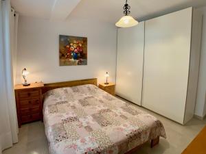 Łóżko lub łóżka w pokoju w obiekcie Clubrent - Townhouse La Merced