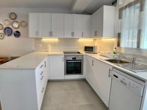 Kuchnia lub aneks kuchenny w obiekcie Clubrent - Townhouse La Merced