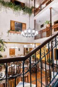 a view from the second floor of a house with a chandelier at Hotel Valdivia Plaza in Jardin