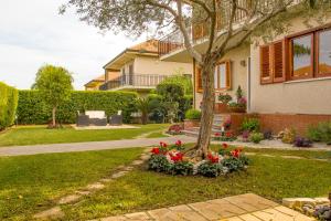 Vonkajšia záhrada v ubytovaní Lillà - Home and Garden