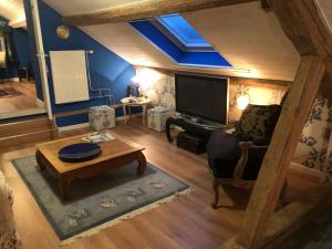 Posezení v ubytování B&B De Eifelhoeve
