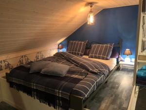 Postel nebo postele na pokoji v ubytování B&B De Eifelhoeve