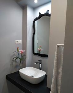 Koupelna v ubytování Kentia Rooms