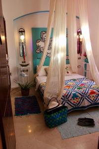 A bed or beds in a room at Beit Matta