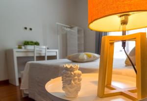 Posteľ alebo postele v izbe v ubytovaní Lillà - Home and Garden