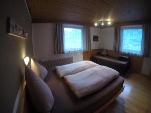 Postel nebo postele na pokoji v ubytování Haus Weitenstich