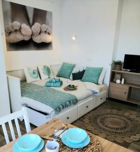A bed or beds in a room at Estudio Pies de Arena