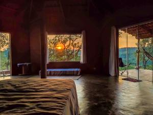 Voodi või voodid majutusasutuse Bangalô Sol e Lua - ao lado da portaria do Parque Nacional toas