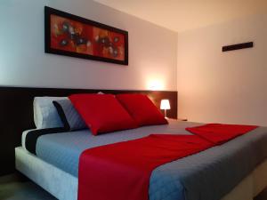 Säng eller sängar i ett rum på Gran Hotel Coral