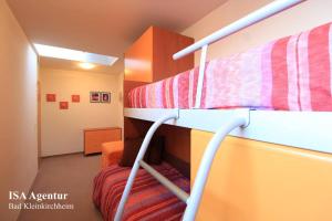 Postel nebo postele na pokoji v ubytování Family Apartment ENZIAN Top 9