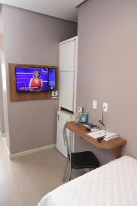 TV a/nebo společenská místnost v ubytování ID Hotel