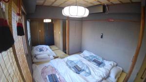 Postel nebo postele na pokoji v ubytování Setouchi Triennale Hotel 403 Japanese style Art Female only - Vacation STAY 62544
