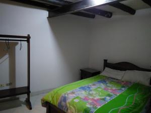 Postel nebo postele na pokoji v ubytování Posada De Los Santos Hotel Rural, La Candelaria