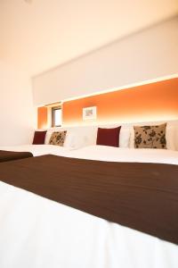 Postel nebo postele na pokoji v ubytování Apartment Hotel Tenjin TUMUGU / Vacation STAY 62183