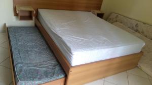 Ένα ή περισσότερα κρεβάτια σε δωμάτιο στο APARTAMENTO FLAT CONDOMÍNIO THERMAS PLACE +14 φωτογραφίες