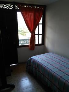 Postel nebo postele na pokoji v ubytování Posada De Los Santos Hotel Rural, La Candelaria