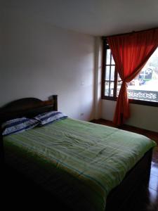 Postel nebo postele na pokoji v ubytování Posada De Los Santos Hotel Rural, La Candelaria