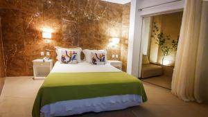 Postel nebo postele na pokoji v ubytování Charme Pousada Boutique & Spa