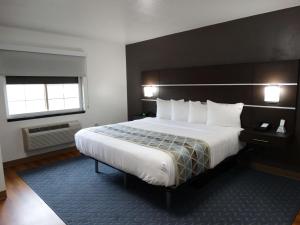 Postel nebo postele na pokoji v ubytování Best Western Duchesne Inn