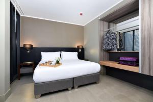Postel nebo postele na pokoji v ubytování Best Western Ferrat