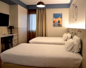 Postel nebo postele na pokoji v ubytování Best Western Plus Soave Hotel