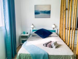 Posteľ alebo postele v izbe v ubytovaní Hibiscus Studio