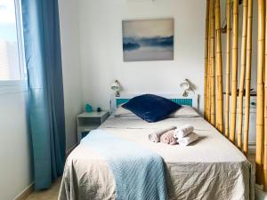 Posteľ alebo postele v izbe v ubytovaní Hibiscus Studio