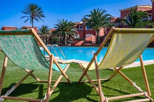 The swimming pool at or close to Home FTV, by Comfortable Luxury