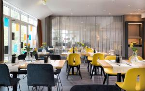 A restaurant or other place to eat at Ramada by Wyndham Hannover