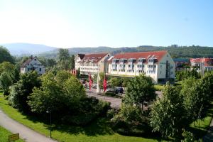 an aerial view of a town with a building at Seminaris Hotel Bad Boll in Bad Boll