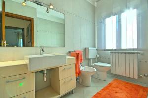 Ett badrum på Villa Ciano