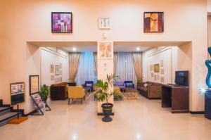 TV i/ili zabavni centar u objektu Daima Hotel Padang