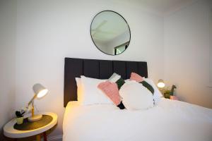 Ένα ή περισσότερα κρεβάτια σε δωμάτιο στο Dell-Lee Cottage