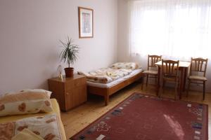 Postel nebo postele na pokoji v ubytování Penzión Koras