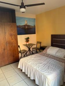 Postel nebo postele na pokoji v ubytování Hotel Posada San Juan