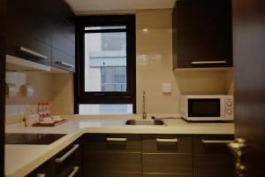 Dapur atau dapur kecil di Ring Service Apartment 798 Art Zone