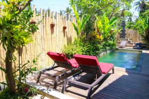 Bazén v ubytování De Rekun Ubud nebo v jeho okolí
