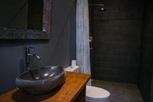 Koupelna v ubytování De Rekun Ubud
