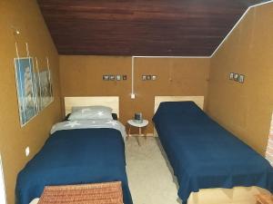 Un pat sau paturi într-o cameră la Holiday Home NA VASI