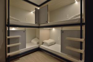Letto o letti in una camera di Atlas Hostel & Backpackers