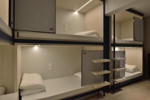 Letto o letti in una camera di Atlas Hostel & Backpackers