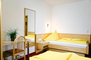 Ένα ή περισσότερα κρεβάτια σε δωμάτιο στο Apart Simone