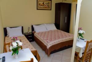 Ένα ή περισσότερα κρεβάτια σε δωμάτιο στο Hotel 4 Stinet