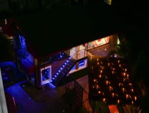 an overhead view of a house with lights on it at Proof Hotel Lekki in Lagos